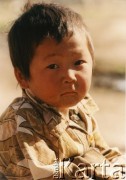Lata 90., Kazachstan.
Portret dziecka.
Fot. Mikołaj Nesterowicz, zbiory Ośrodka KARTA
