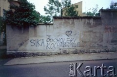 Po 1989, Kraków, Polska.
Napis na murze 