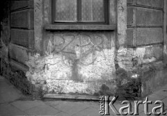 1992, Kraków, Polska.
Napis na murze 