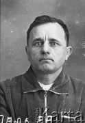 1938, ZSRR.
 Alfred Pal, rozstrzelany w czasie Wielkiej Czystki, portret więzienny.
 Fot. zbiory Ośrodka KARTA.
   
