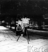 Lipiec 1962, Warszawa, Polska.
Uliczny fotograf.
Fot. Jarosław Tarań, zbiory Ośrodka KARTA [62-48]

