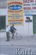Lata 90., Piaseczno k. Warszawy, Polska.
Reklamy.
Fot. Bogdan Łopieński, zbiory Ośrodka KARTA